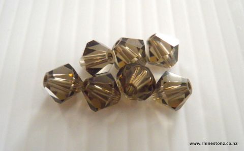 Swarovski Bicone Art 5328 Smoky Quartz 4mm